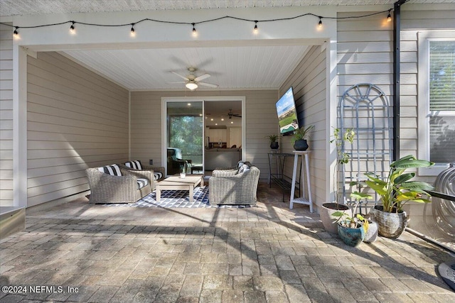 view of patio / terrace featuring ceiling fan