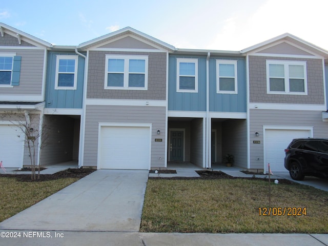 view of property featuring a garage