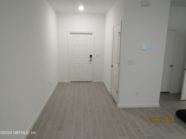 hallway featuring light wood-type flooring