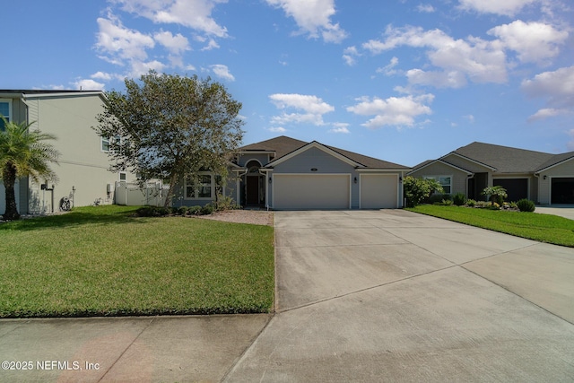 ranch-style house featuring driveway, a front lawn, and an attached garage