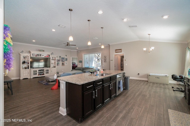 kitchen with vaulted ceiling, dishwasher, dark wood-type flooring, and a sink