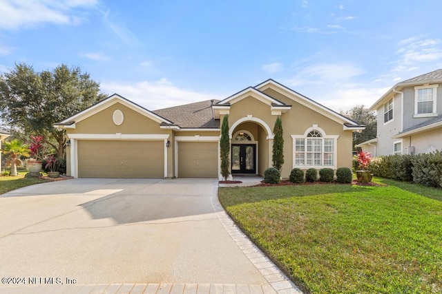 view of front facade featuring french doors and a front lawn