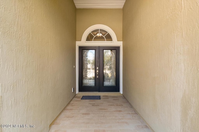 doorway to property featuring french doors