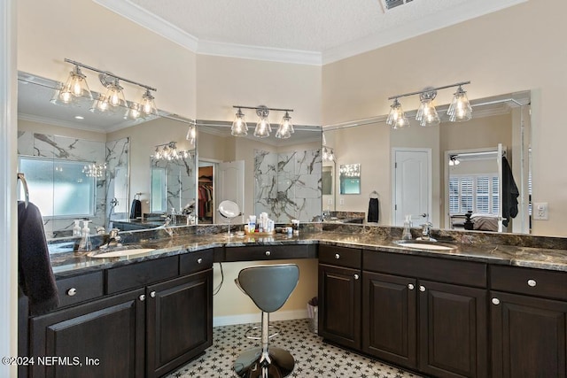 bathroom featuring a shower, vanity, a textured ceiling, and ceiling fan