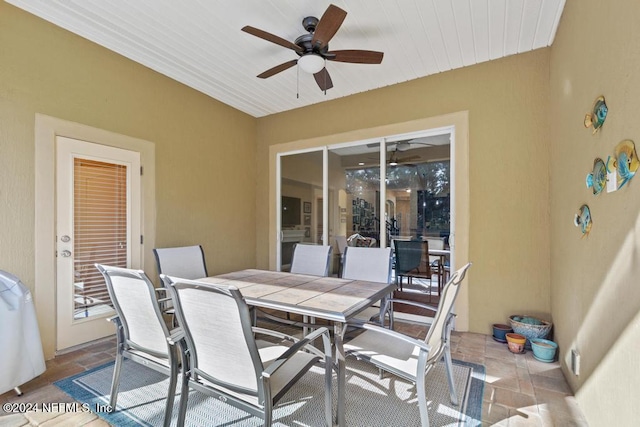 view of patio featuring ceiling fan