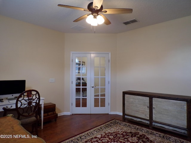 office area with a textured ceiling, ceiling fan, french doors, and dark hardwood / wood-style floors