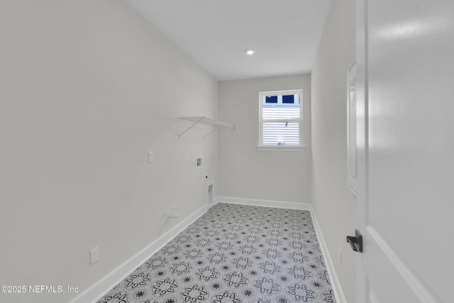laundry area featuring washer hookup, baseboards, and electric dryer hookup
