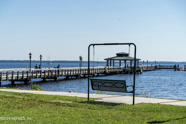 dock area with a gazebo and a water view