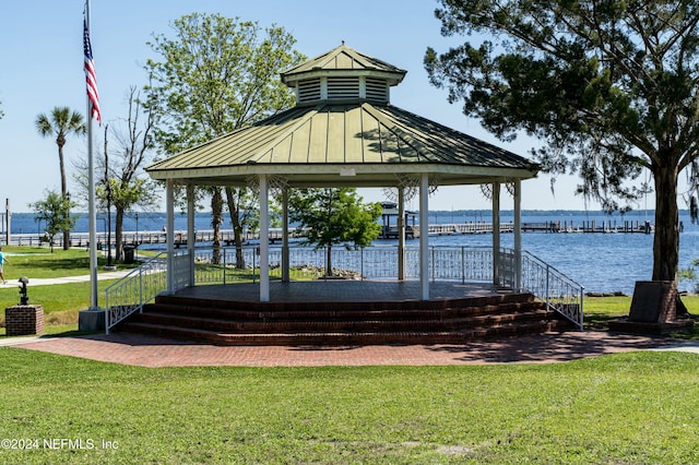 view of home's community featuring a gazebo, a yard, and a water view