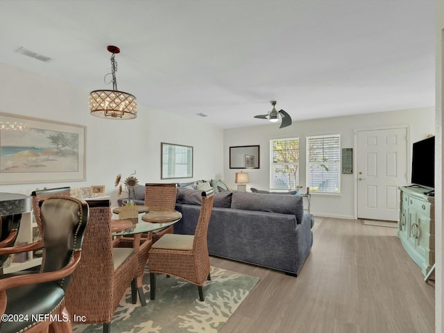 156 Sandy Beach Ln, Atlantic Beach, FL 32233 - dining room featuring light wood-style flooring and ceiling fan