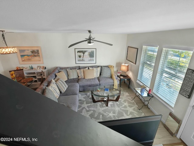 156 Sandy Beach Ln, Atlantic Beach, FL 32233 - living room featuring a ceiling fan and baseboards