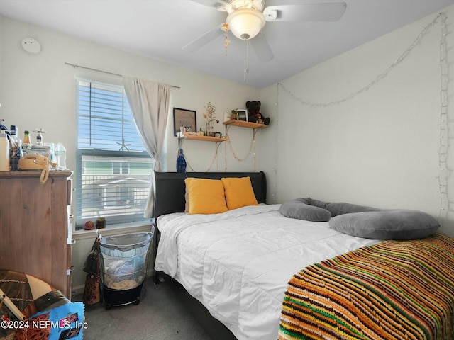 bedroom featuring ceiling fan and carpet flooring