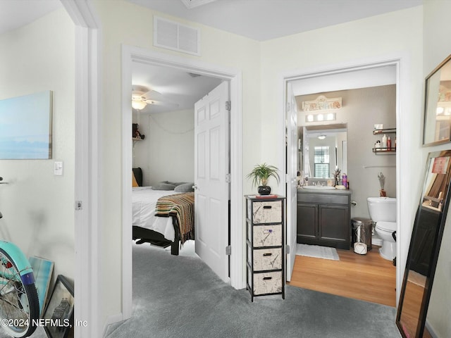 156 Sandy Beach Ln, Atlantic Beach, FL 32233 - corridor with carpet flooring and a sink