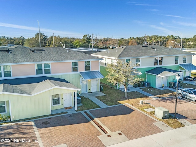 view of front of property with central AC unit