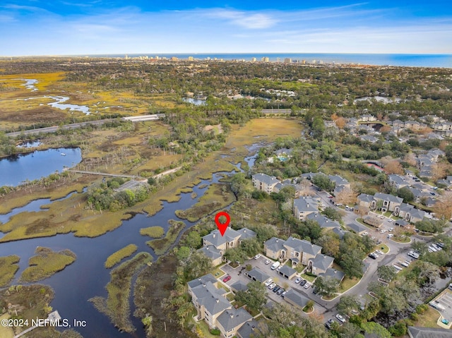 drone / aerial view with a water view