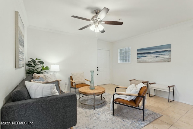 living room with crown molding, ceiling fan, and light tile patterned flooring