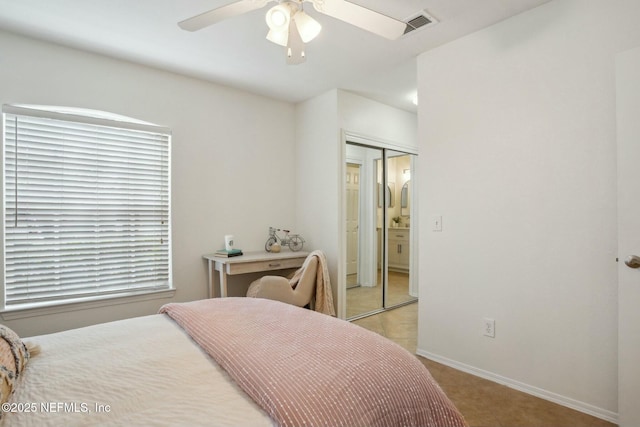 bedroom featuring a closet and ceiling fan