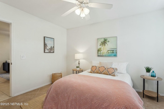 bedroom featuring ceiling fan and light tile patterned floors