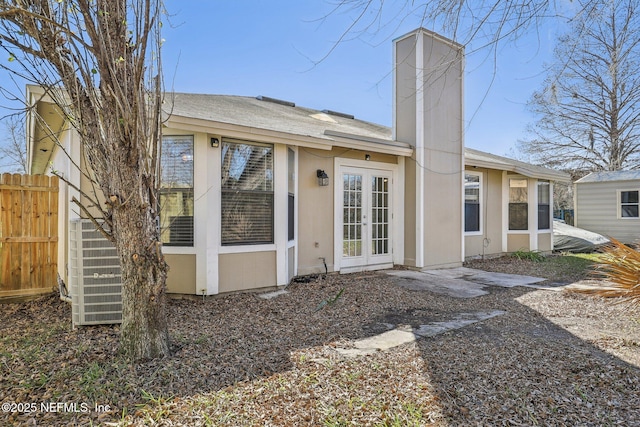 back of property with french doors