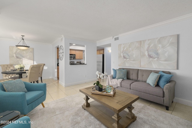 tiled living room featuring a textured ceiling and crown molding