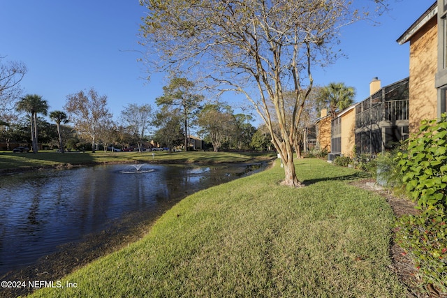 view of yard with a water view