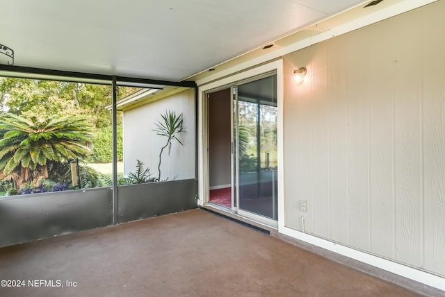 view of unfurnished sunroom