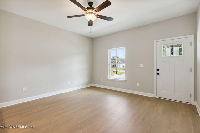 entryway featuring ceiling fan, a healthy amount of sunlight, and light hardwood / wood-style flooring