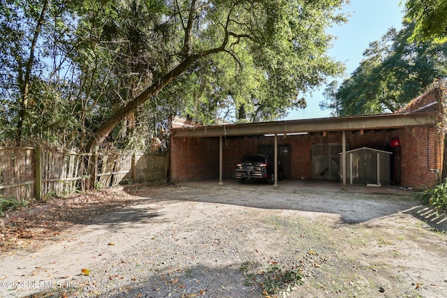 exterior space featuring a carport