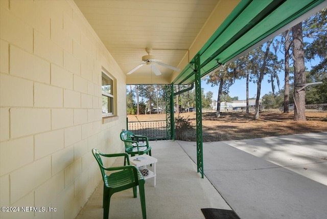 view of patio with ceiling fan