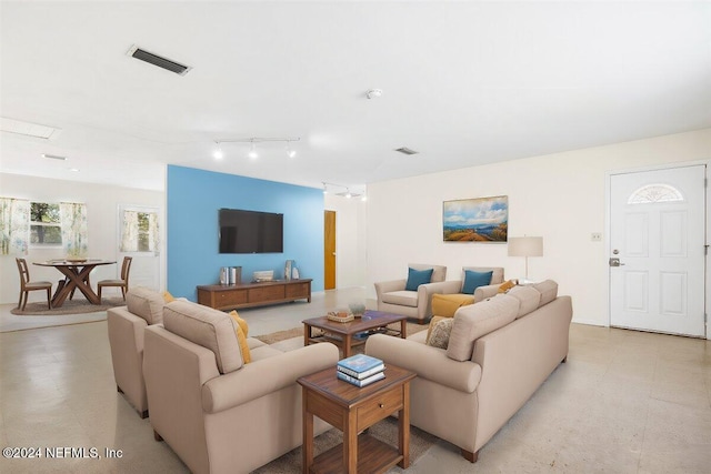 living room featuring ceiling fan