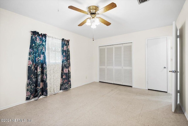 unfurnished bedroom with ceiling fan