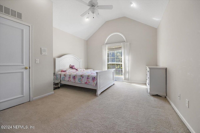 carpeted bedroom featuring ceiling fan and lofted ceiling