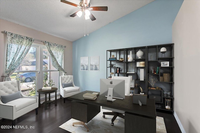 home office featuring lofted ceiling, ceiling fan, dark hardwood / wood-style flooring, and a textured ceiling