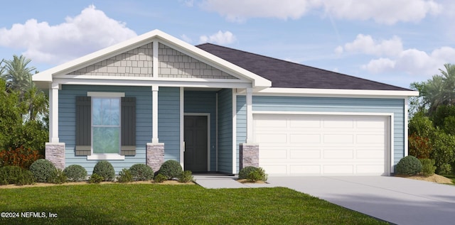 view of front of house with a front yard and a garage