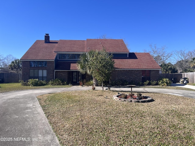 view of front of home with a front yard