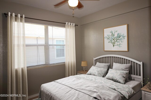 bedroom featuring ceiling fan