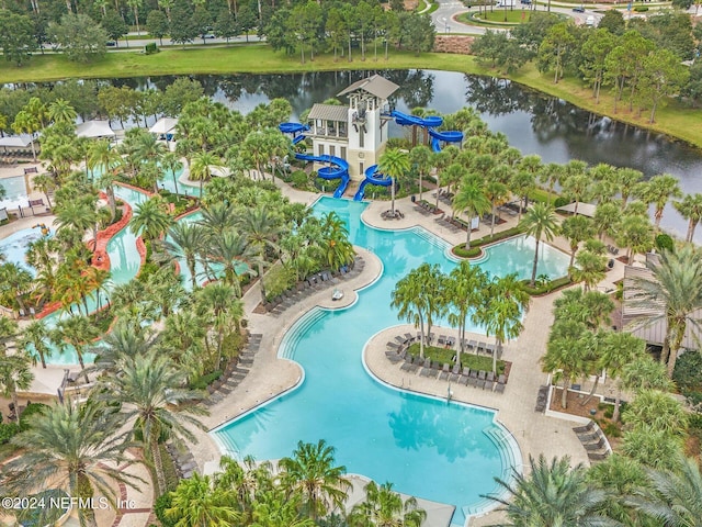 view of swimming pool with a water view