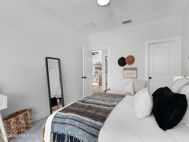 carpeted bedroom featuring ceiling fan