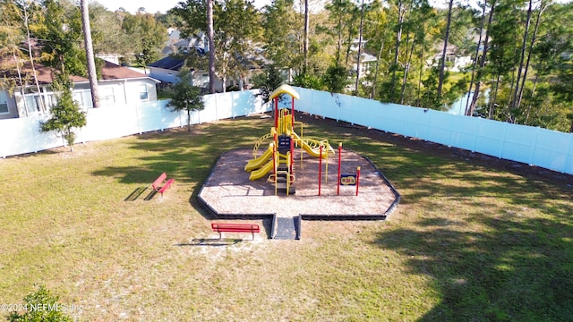 view of jungle gym with a yard