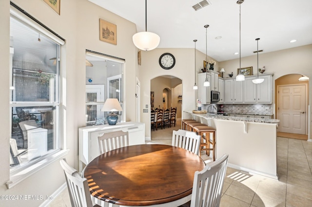 dining room featuring light tile patterned floors