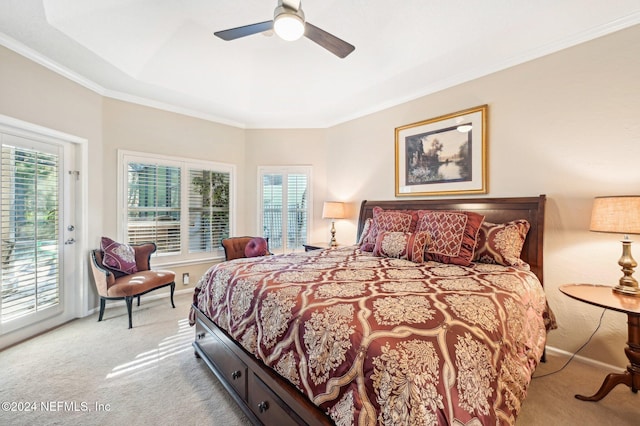 carpeted bedroom with access to outside, ceiling fan, and ornamental molding