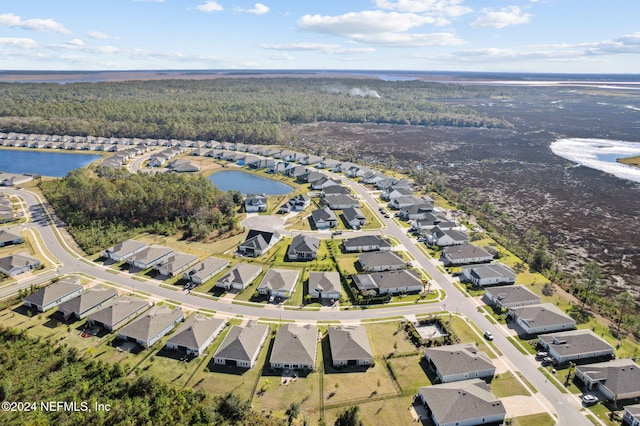 aerial view featuring a water view