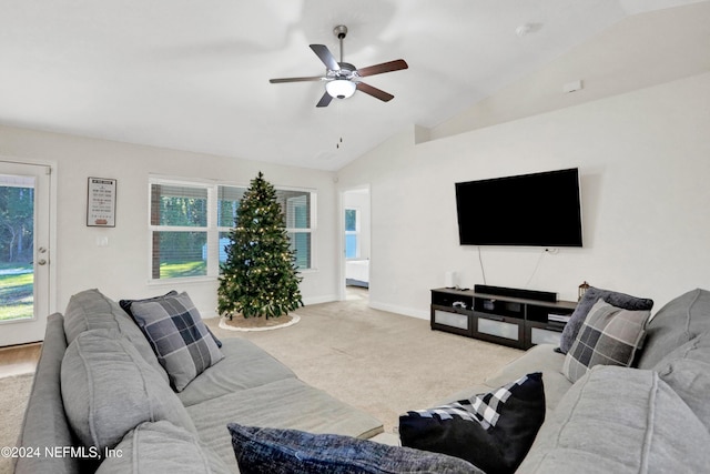 living room with light carpet, ceiling fan, and lofted ceiling