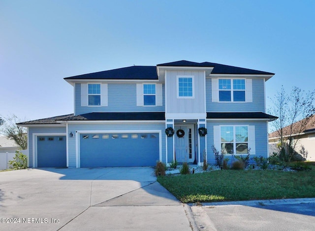 view of front of property featuring a garage