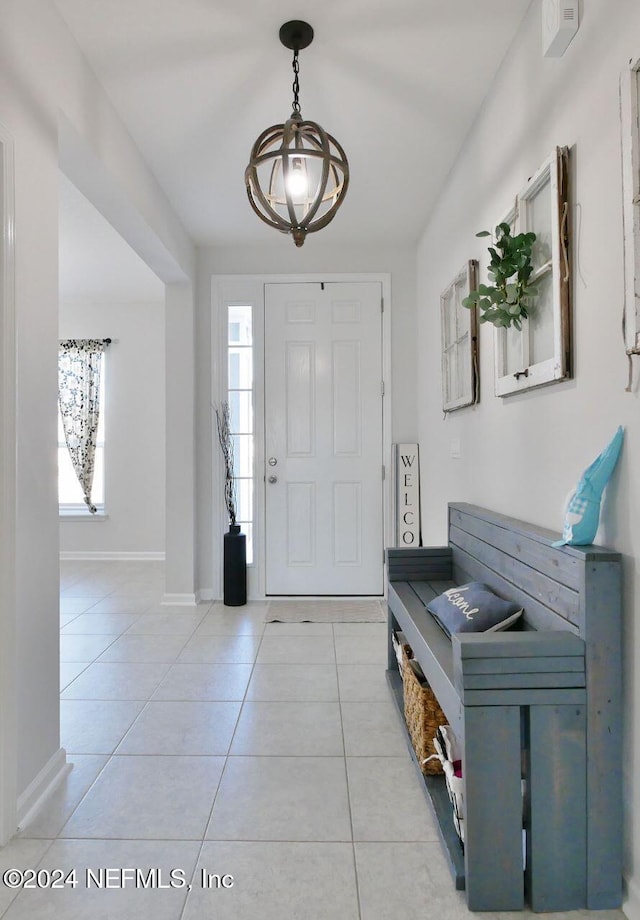 foyer with light tile patterned flooring