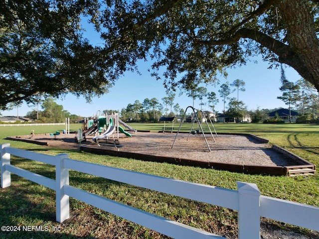 view of jungle gym with a yard