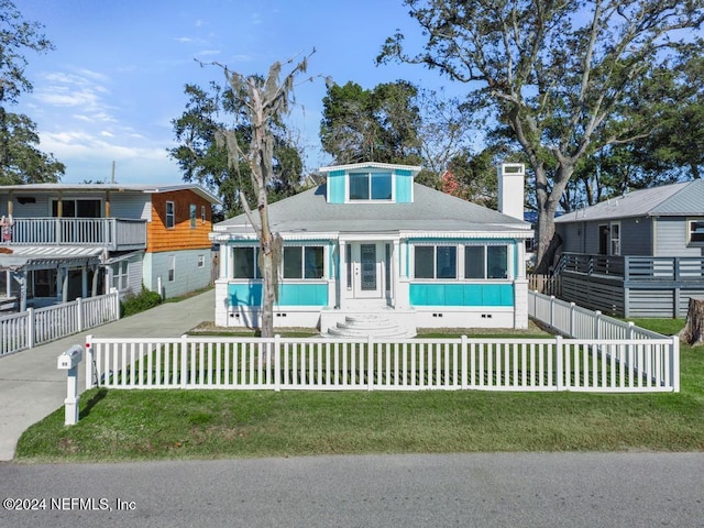 view of front of home with a front yard