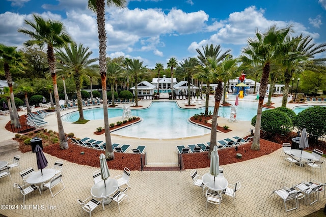 view of swimming pool with a patio area