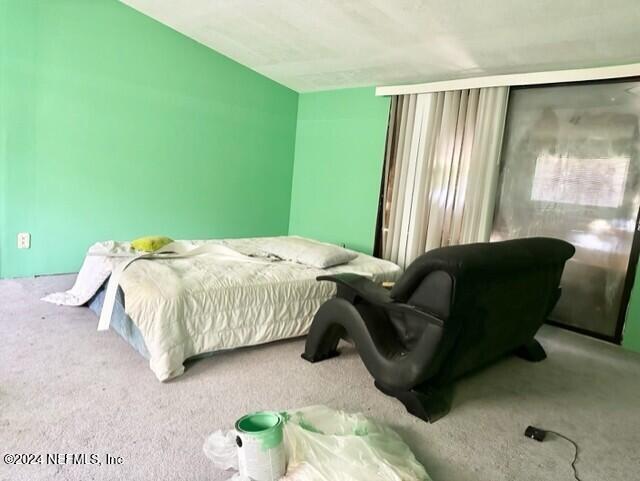 bedroom featuring carpet flooring