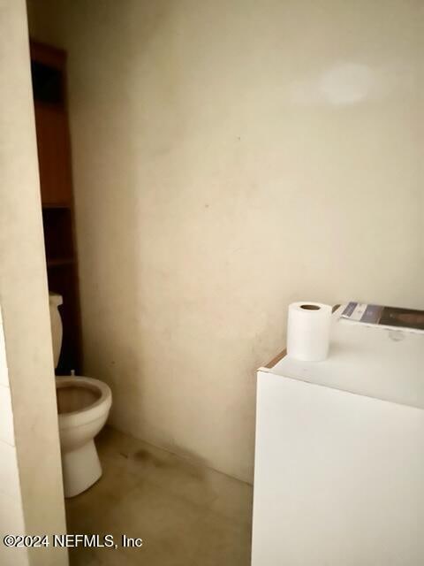 bathroom featuring toilet